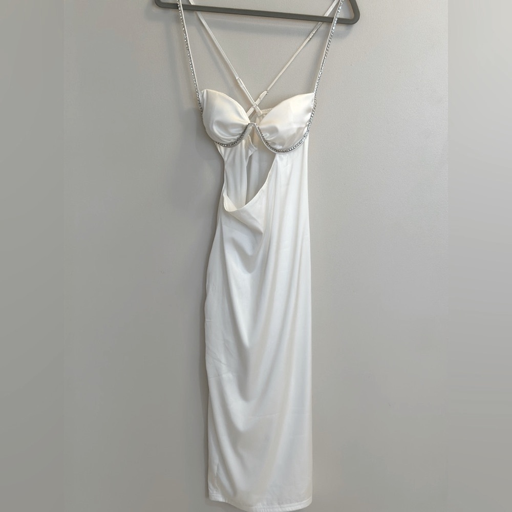 Silky with dress with cut out, and rhinestone trim